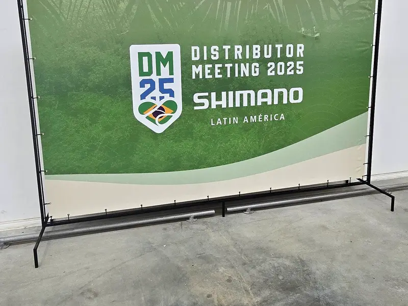Backdrop do Distributor Meeting 2025 da Shimano